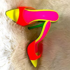 Neon color-block 5 inch pointed toe mule.
